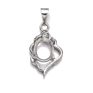 Pendant with Cubic Zirconia Inlays and Oval Mounting and Bail in Sterling Silver 8x10mm