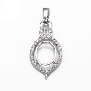 Pendant with Cubic Zirconia Inlays and Oval Mounting and Bail in Sterling Silver for 8x10mm Stones