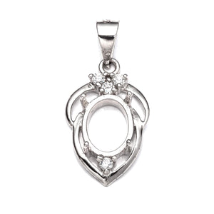 Pendant with Cubic Zirconia Inlays and Oval Mounting and Bail in Sterling Silver 7x9mm